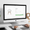 Computerbildschirm zeigt einen B2B-Webshop mit konfigurierbarem Stuhl, Produktoptionen, Preis und Warenkorb.